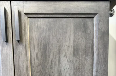 Photo of a shrinking center panel on a stained door, showing an unfinished area