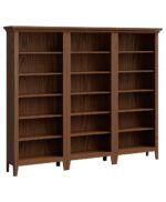 The Ashton Modular Bookcase is a three-section bookcase with multiple shelves and a simple, classic frame with a top molding.