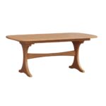 The Kirkland Trestle Table features a solid wood construction with elegant, curved trestle legs and a connecting stretcher for a sturdy dining experience.