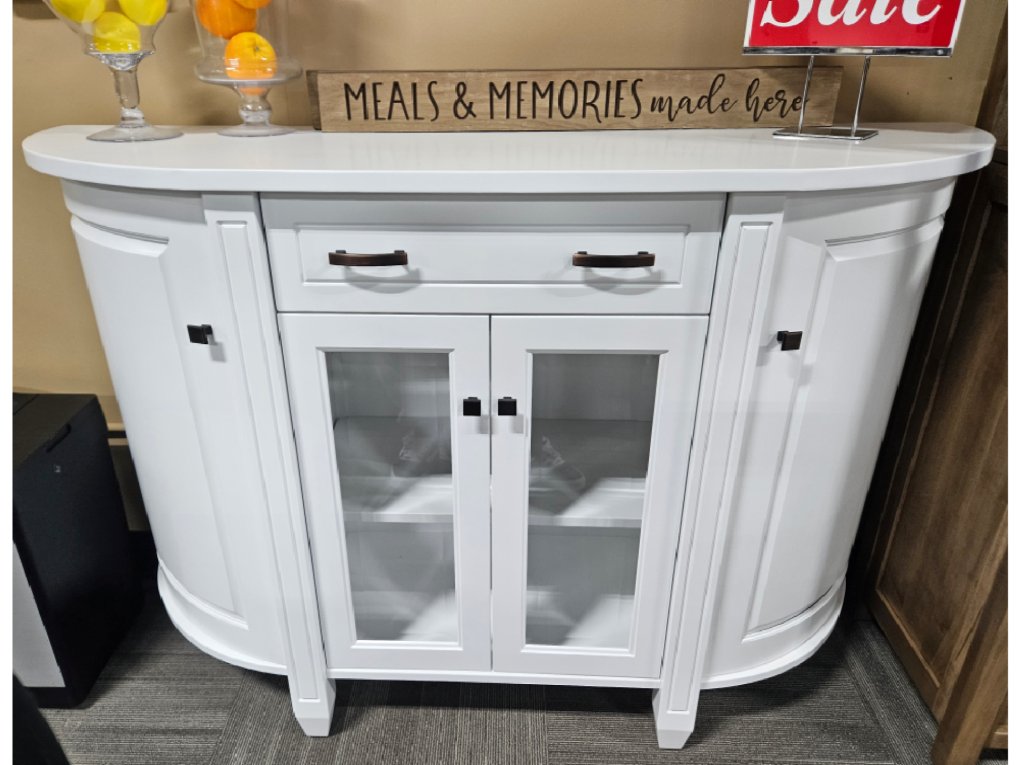 This handcrafted Adrian Buffet features a curved solid wood frame with glass-paneled doors, ideal for dining room storage.