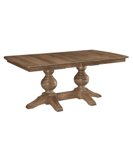 This Bradley Double Pedestal Table is a solid wood dining table with a rectangular top and two large turned pedestals.