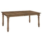 This Carlin Leg Table is a solid wood dining table with a rectangular top and four turned legs, ideal for any kitchen.