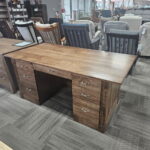 This solid wood Northport Executive Desk features a spacious top and double pedestals with ample storage for your office.